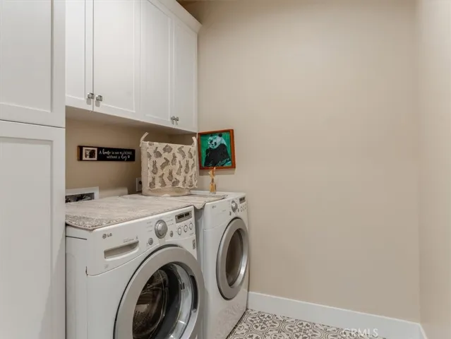Laundry with lots of cabinets