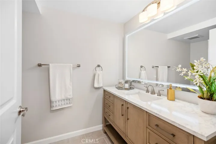 Guest bathroom with designer cabinet