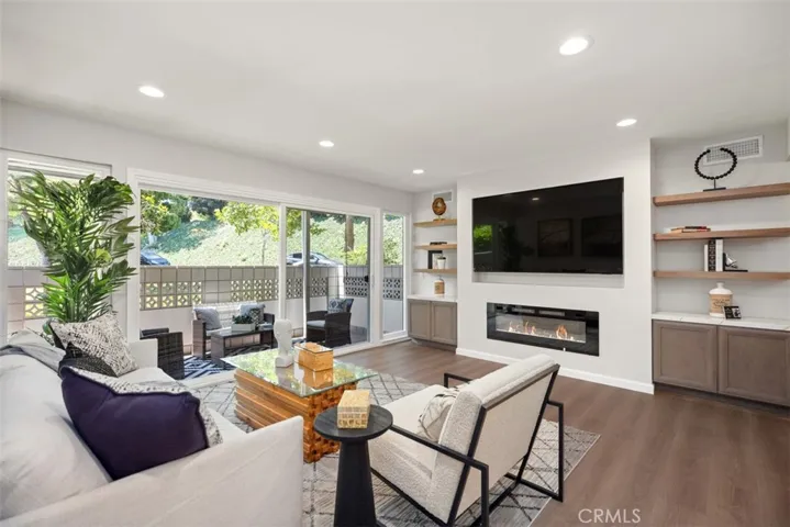 Feature wall includes a 75" flat screen TV