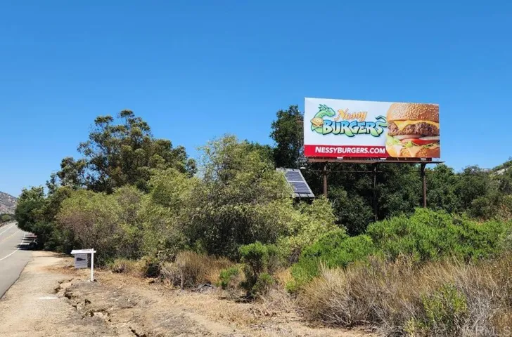 Approx S/W corner. Earns income.