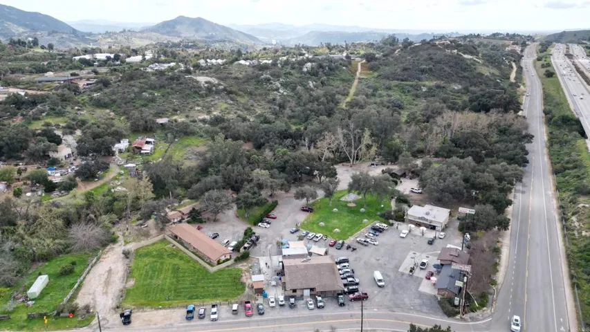 The property is behind Rainbow Oaks restaurant that is shown in the​​‌​​​​‌​​‌‌​​‌​​​‌‌​​​‌​​‌‌​​‌‌​​‌‌​​​​ photo.