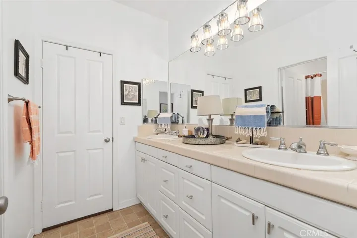 This is the vanity area of bath between bedroom 3 and 4.