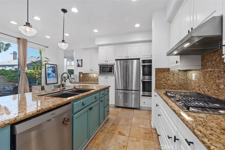 Kitchen shows the desk in corner.