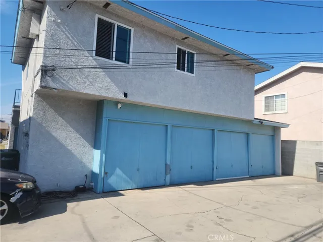 4 Single car Garages at rear of property.