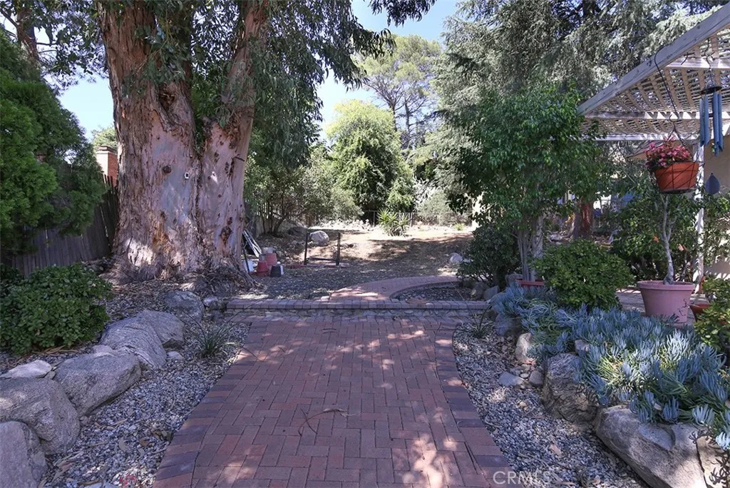 View along walkway toward rear of lot