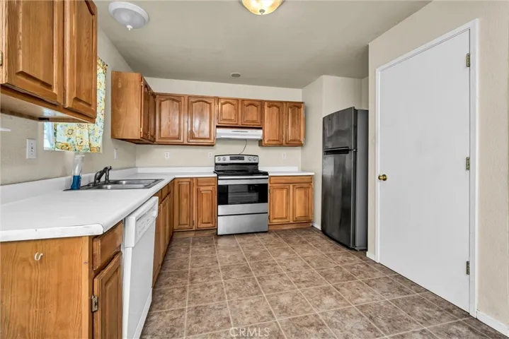 Kitchen has a pantry and includes all appliances.