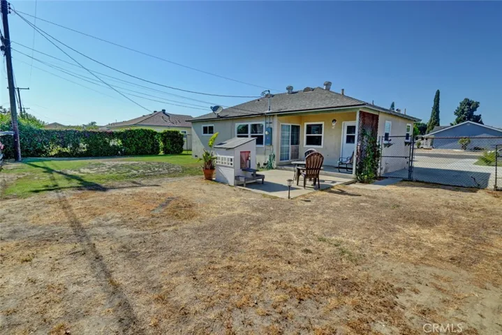 Expanded driveway offers potential for RV parking.
