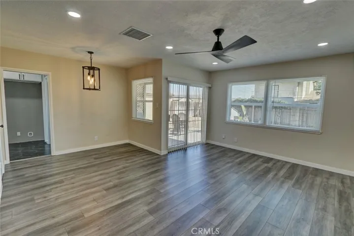Living and dining room areas are open and light.