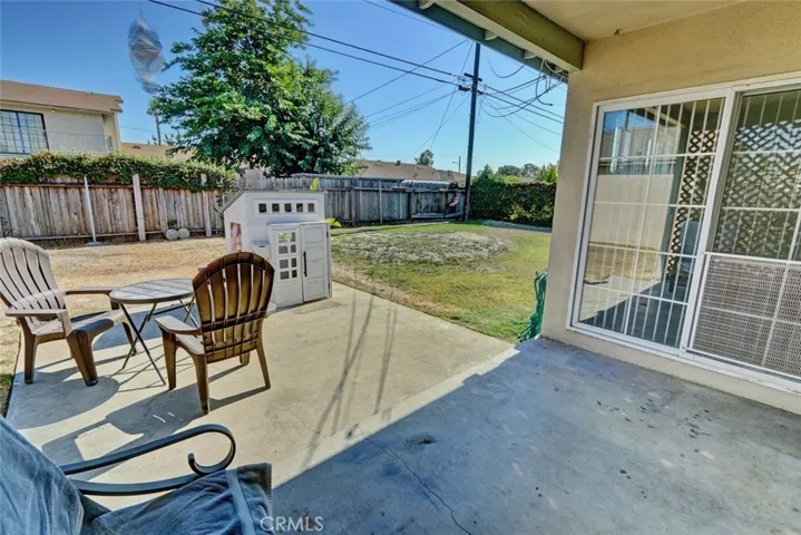 Protected covered patio area plus open concrete slab.