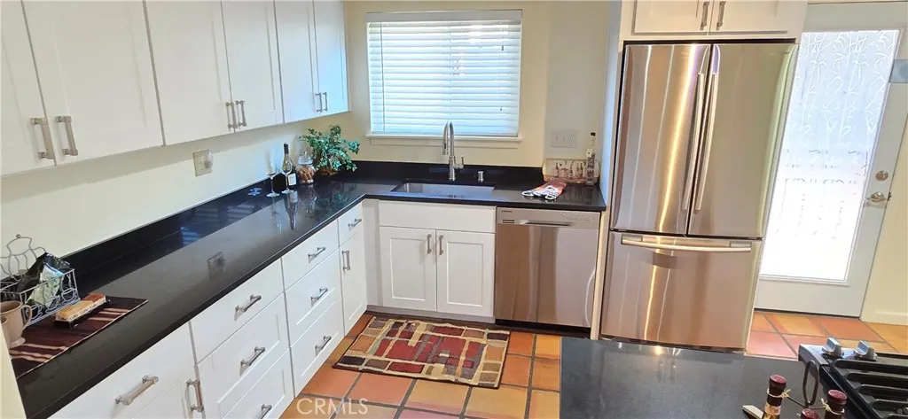 Remodeled kitchen. Newer cabinets, Quartz counter tops & stainless steel appliances