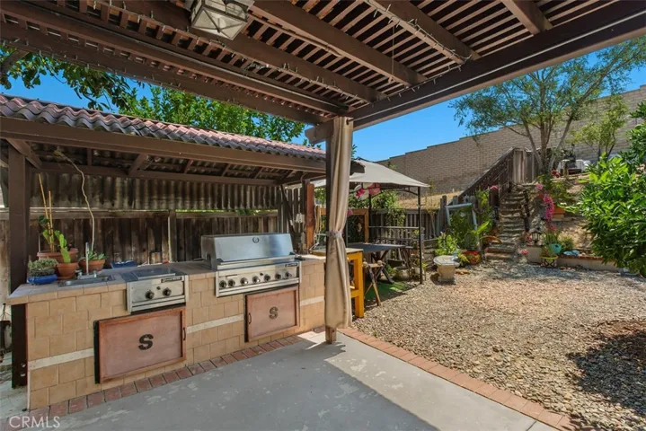 Covered outdoor BBQ area.