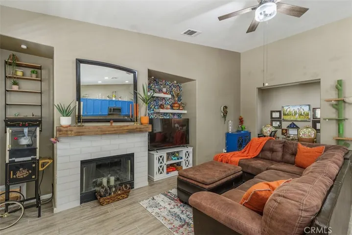 Another angle of the family room showcasing the entrance to the den.
