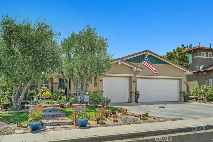 Full front view of the home with a three-car garage.