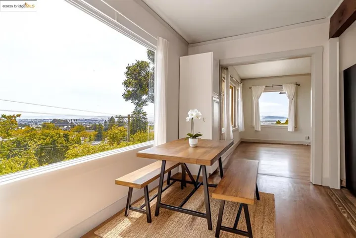 Dining space featuring light wood finished floors and baseboards