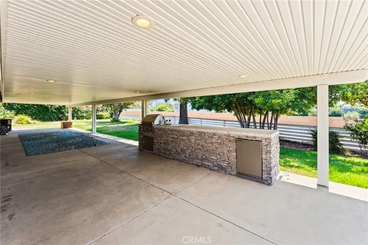 Backyard patio cover with built in BBQ