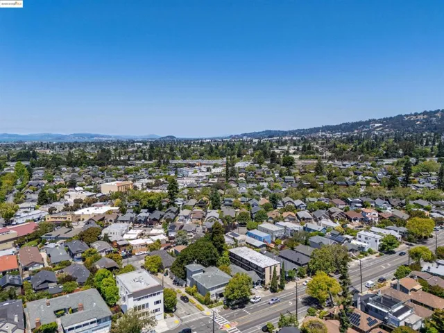 Aerial view of residential area featuring a mountain backdrop