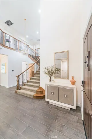 Foyer with soaring high ceiling