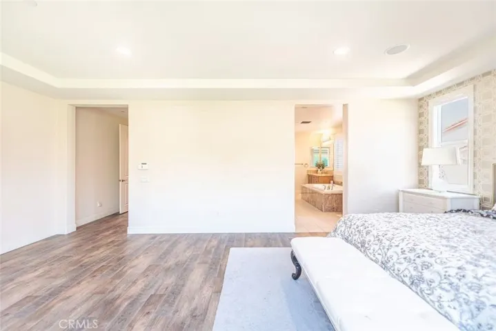another view of primary bedroom