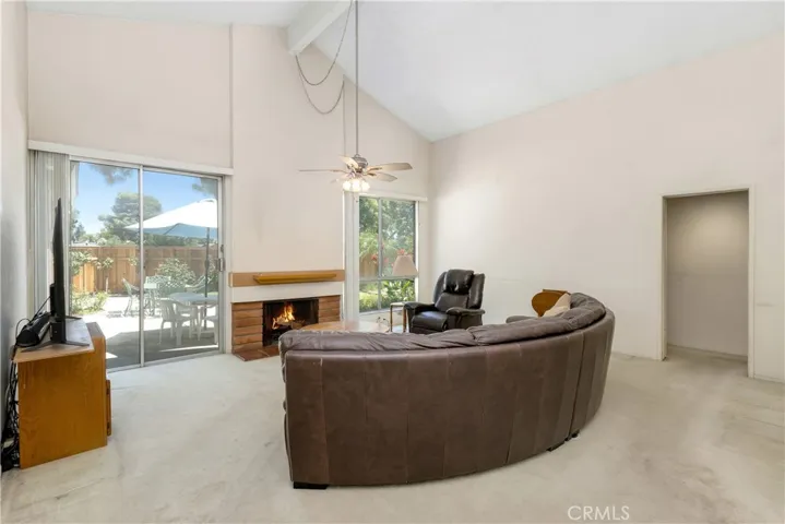 Living room and dining room have a grand feel with vaulted ceilings, fireplace, and tons of natural​​‌​​​​‌​​‌‌​​‌​​​‌‌​​​‌​​‌‌​​‌‌​​‌‌​​​​ light.