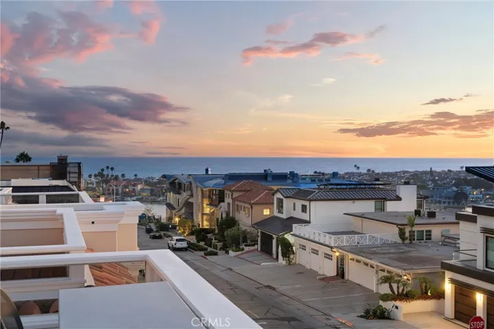 Take-in citrus-kissed sunset views over Newport Harbor from your own private retreat.