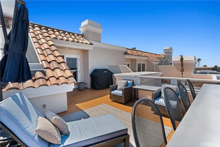 Elevated seating at the rooftop bar ensures picture-perfect ocean and harbor views with every glance.