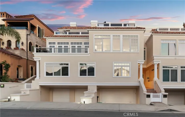 Situated just one block from the ocean, this beautifully reimagined Corona Del Mar home offers the pinnacle of luxury and parking for up to 8 cars.