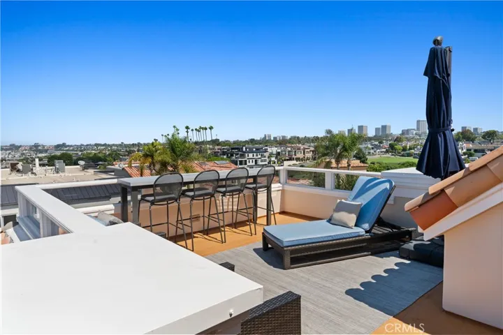Enjoy sweeping coastal vistas and refreshing ocean breezes from this elevated outdoor living space.