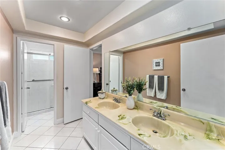 Primary Bedroom #1 on Main Floor Ensuite Bathroom with Double Sinks