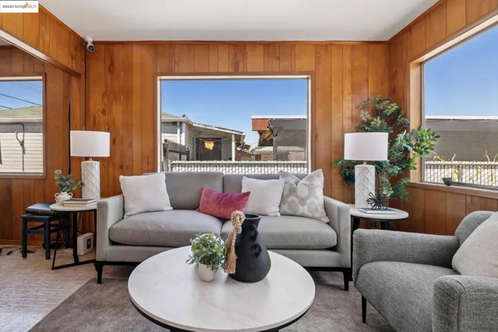 Living area with wood walls