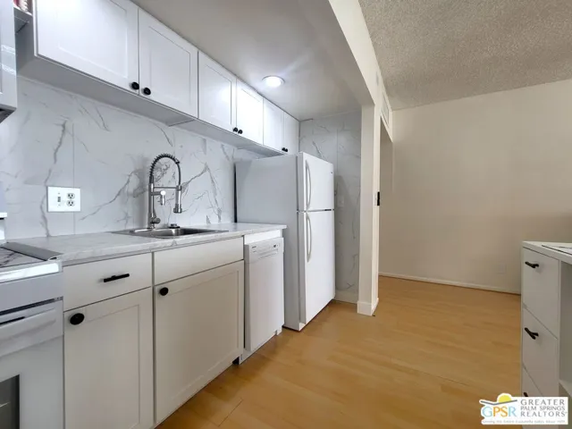 Galley Kitchen With Full Sized