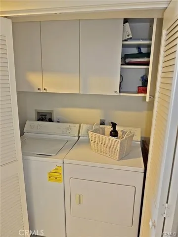 Laundry in hallway closet