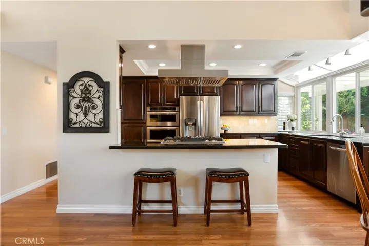 The kitchen overlooks the family room area, so you can watch TV while you are cooking.