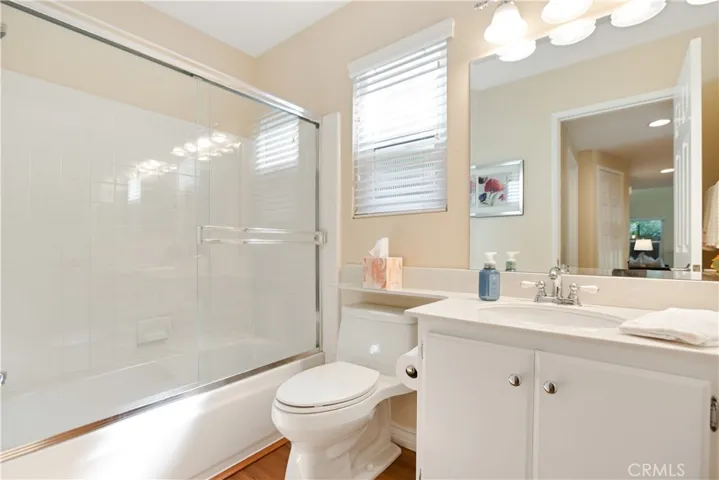 Just outside of the downstairs bedroom you will find this full bathroom.