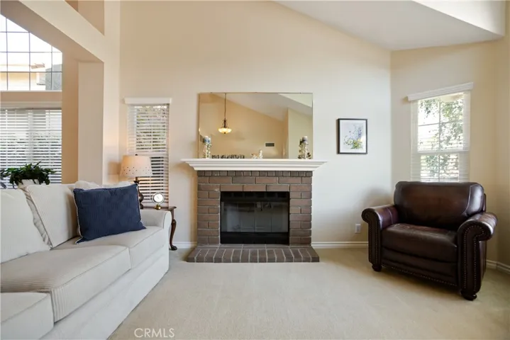 You will find a cozy fireplace in both the living room and family room!