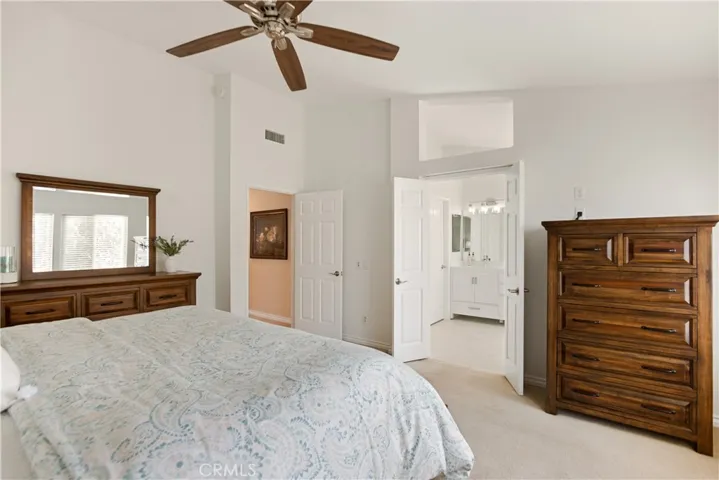 The bathroom has its own set of doors, so if you get up earlier, you won't disturb the person who is still sleeping.