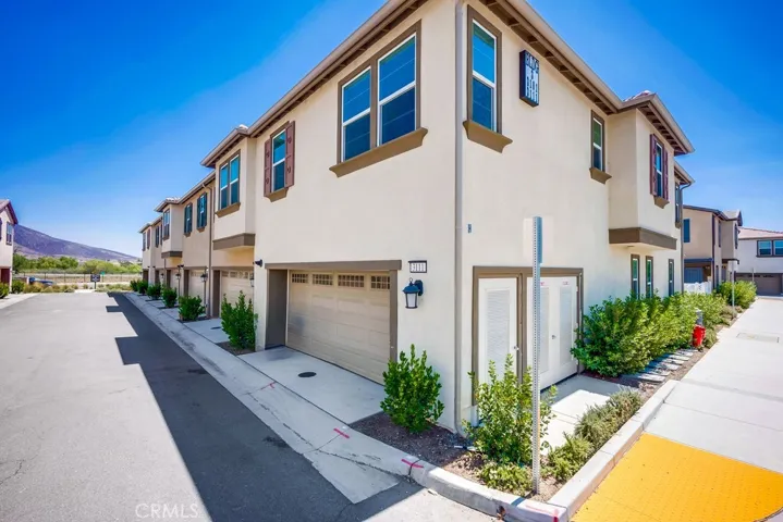 End unit with 2 car garage