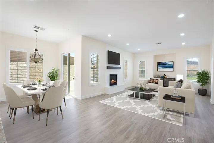 Virtually Staged - Main House - Family Room and Eating Area