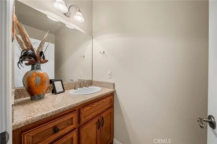 Powder room at hall.
