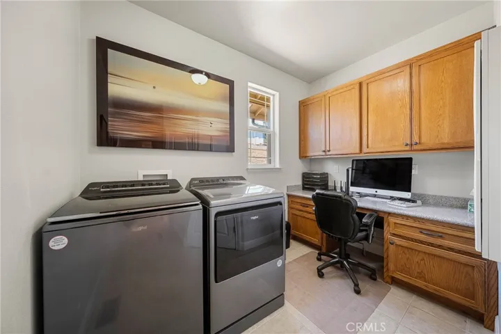 Laundry room with office area
