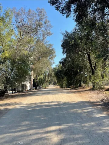 Property is at the end of this road at chained fence.