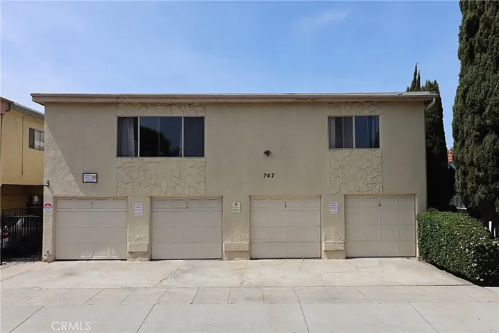 4 Garages with Parking in Front