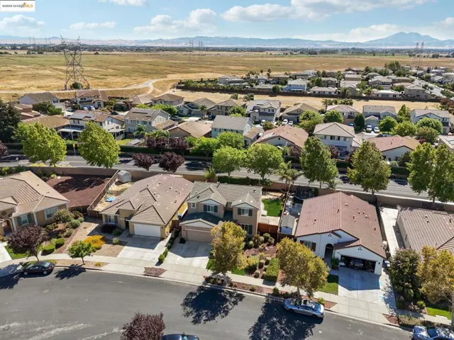 Aerial view of residential area with a mountain backdrop