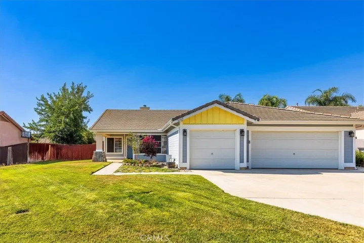 Attractive entry with 3 car garage.