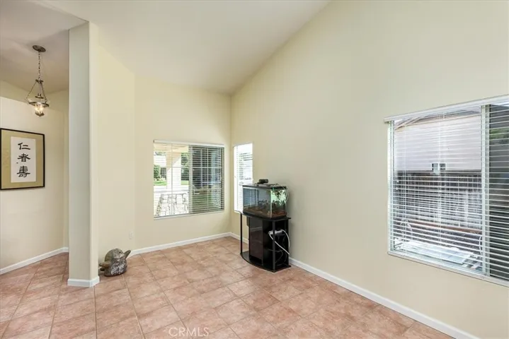 Front living space with window out to front porch.