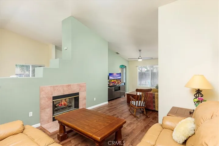 Portion of family room with double sided gas fireplace.  Accommodates large sectional seating.
