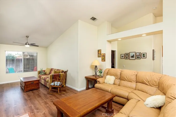 Comfortable family room with area for dining table or additional seating.