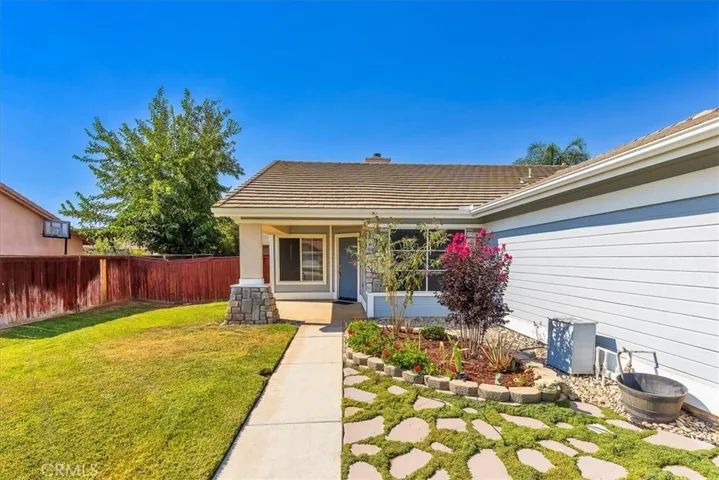 Nicely landscaped with covered front porch.