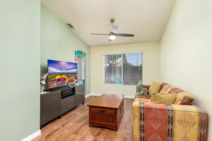 Room for dining table.  Currently used as additional TV room.