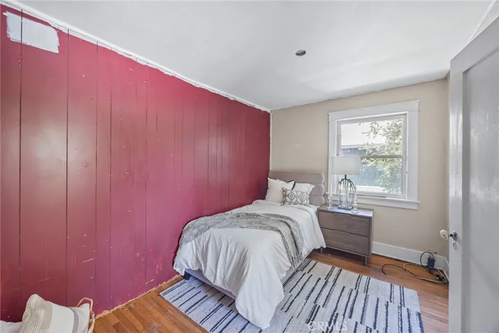 2nd Upstairs Bedroom. This wall can easily be removed to restore the Primary Suite