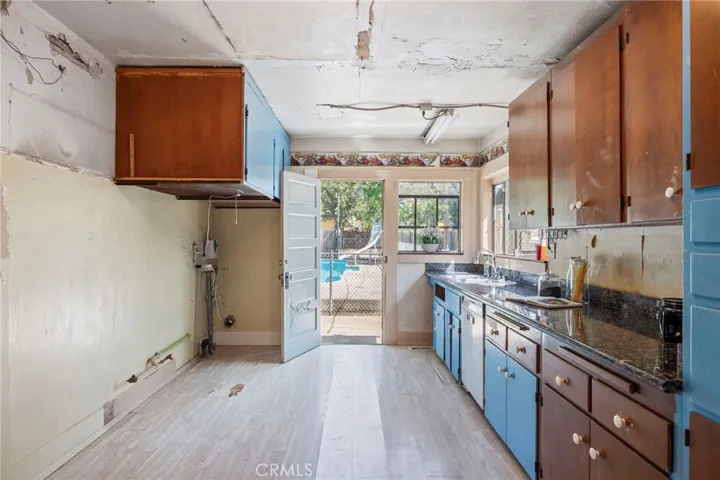 Kitchen is waiting for a modern remodel.